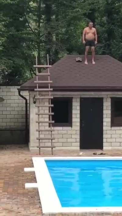 Horrific attempt to dive into a swimming pool from a roof ends in a spectacular faceplant