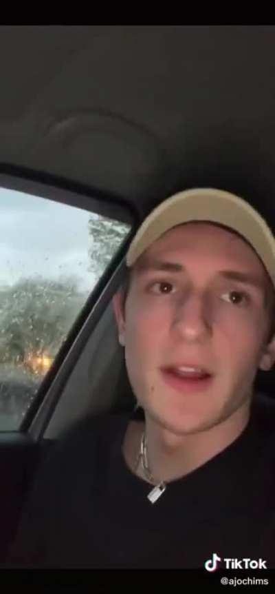 Dude sitting in his car during a tornado
