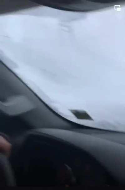 Idiot lowers snowplow as he pass two pedestrians to deliberately pile snow on them. Idiot is now suspended by the company he works for.