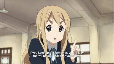 Mugi giving Yui a good scolding
