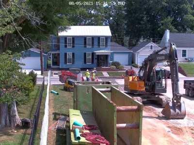 She literally drove around the road closed sign and crossed the wet cement in the wrong lane.