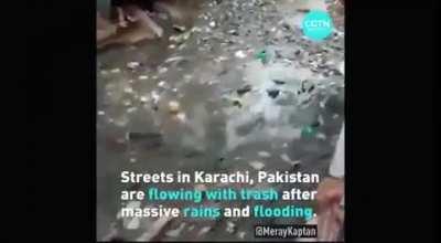 Disturbing shit found in Karachi's river of trash after rain.