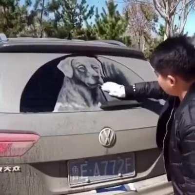 Drawing a good boi behind a random citizen's car