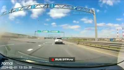 Russia. Driver of a Opel hit a bumper then lost control, hit a guardrail and then a truck. No info on both drivers.