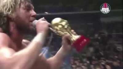 Kenny Omega sings “Teenage Dream” to a very confused Japanese crowd