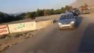 Pakistani Taliban leaders reuniting with fighters after being freed by Taliban in Afghanistan. Traveling in a large convoy of Taliban fighters. Says: 