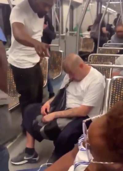 Man Randomly Punches Sleeping Passenger on Train in Shocking Attack