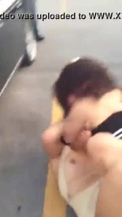 Two women fight in parking lot