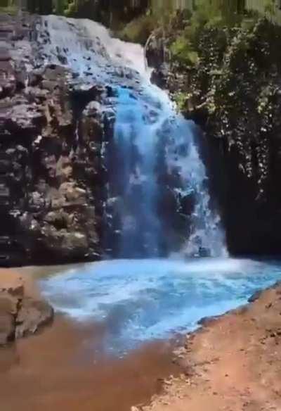 A couple in Brazil painted a waterfall for their gender reveal party.