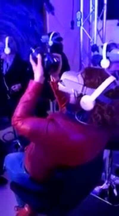 She’s trying to take pictures of the vr world