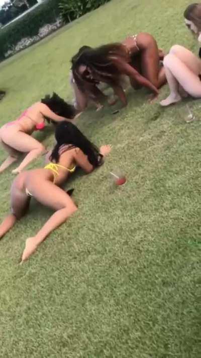 Twerking in a yellow thong