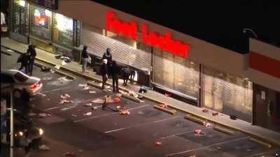 Looting at Philadelphia foot locker, liquor store, and other shops in the area 8PM EST, FOX29