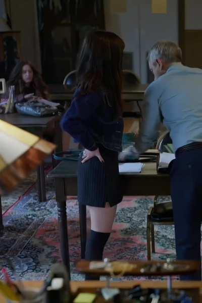 This looks like a scene where the student wants extra credit from the college professor she would be so good in role playing