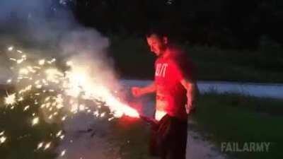 An idiot plays around with fireworks