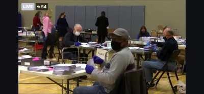 Voter fraud caught on camera in Germantown, MD. Poll worker either fills out blank ballot or changes existing one.