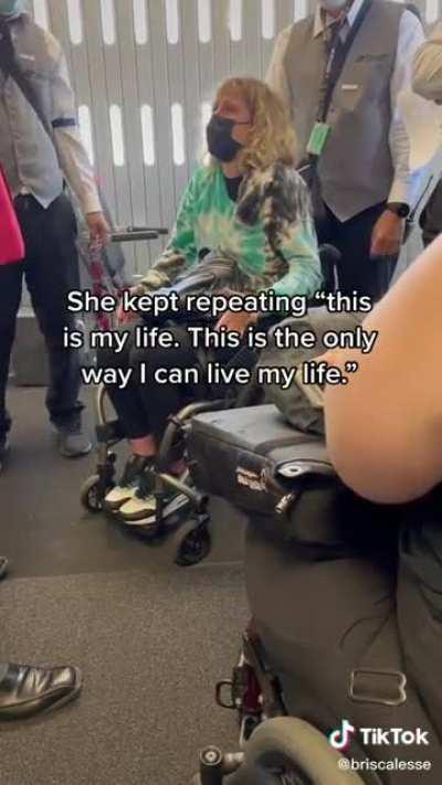 Delta airlines breaks a handicapped woman’s chair. She sobs with frustration and sorrow at the situation.