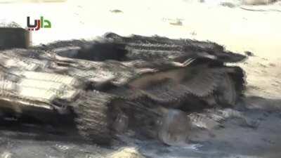 Syrian T-72's head separated from its body in Darayya