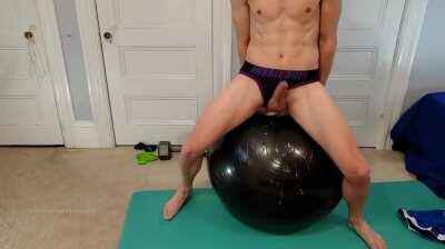 Riding a dildo on an exercise ball