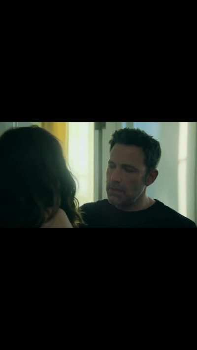 Sucking a finger suggestively and talking dirty in 'Deep Water' (2022)