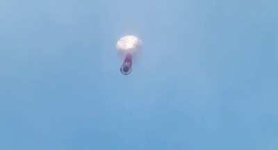 Launching a balloon of fireworks right above their heads