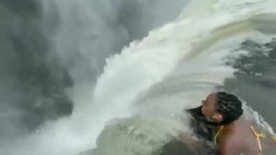 Standing this close to a 380 feet waterfall is a thing (Devil's pool - Victoria falls )
