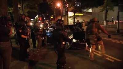 An alert about a 9pm curfew enforcement was sent to Atlanta residents at approximately 9:13pm. Police stopped them, broke the window to their car, tazed them, tackled them and arrested them.