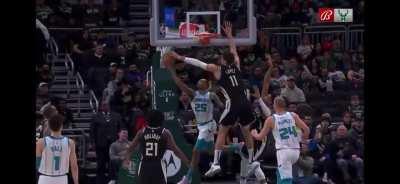 [Highlight] DPOY candidate Brook Lopez attempts to block the shot, misses, but gets the block with his left hand after the forced reverse layup, all in one motion. Before fouling out, Lopez collected 5 blocks