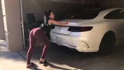 Lia pushing her car