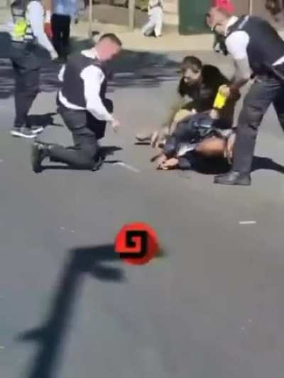 Terrorist who stabbed two people in London this morning is tased and arrested