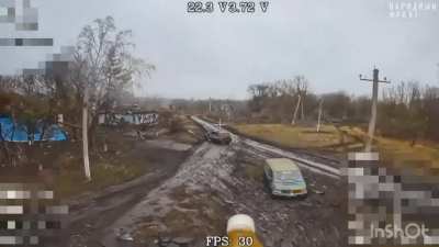 Russian fiber-optic FPV drone strikes a Ukrainian vehicle. 
