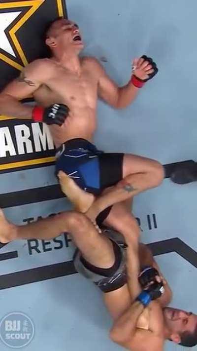 Ultra Slow Mo: Tony Ferguson's face in Agony as he Survives a Heel Hook from Beniel Daruish.