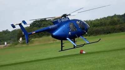 Skilled pilot resetting a cone before leaving.