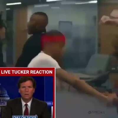 tucker reacts