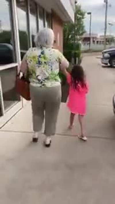 Racist woman get mad someone is wearing a BLM shirt, hits them with car.