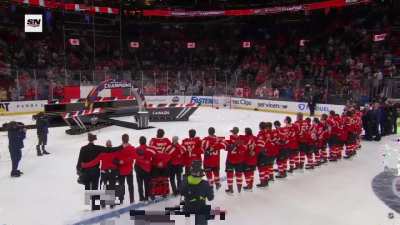 The Canadian anthem is played in celebration of Team Canada's win