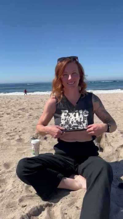 A little flash on the beach while all the tourists walk by. [GIF]