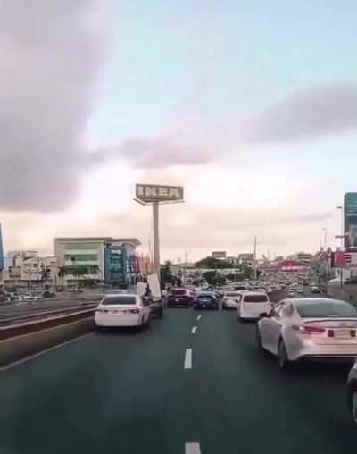 Car blocking ambulance on call