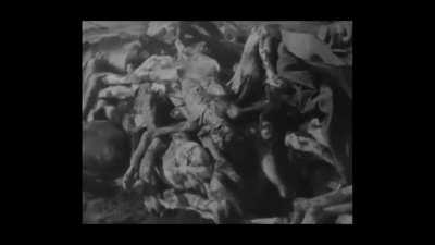 Heavy-equipment being used for cleanup at a Nazi Concentration Camp