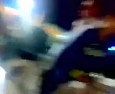 Stupid man gets distracted and is shot by a child with his own gun