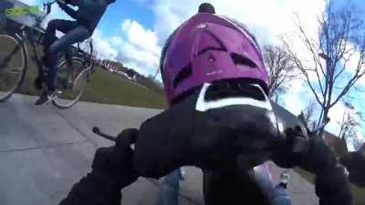 Guy showing off on his cool pink scooter. *HONK*