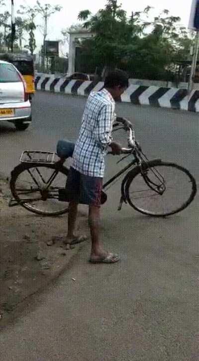 Guy was heavily drunk and the dude filming doesn’t stop him from using his bike next to a road.