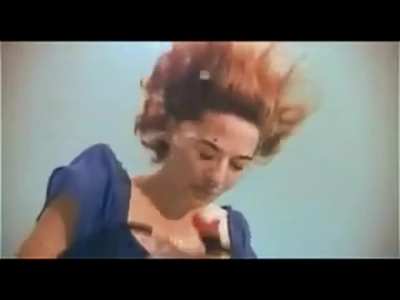 WOMAN SINGING UNDERWATER WITH LOUD BUBBLES