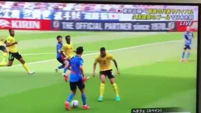 A Japanese soccer player nutmegged(ball passing between the legs) four people to score a goal