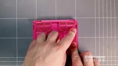 A mini collapsible, stackable crate for all your small parts storage.