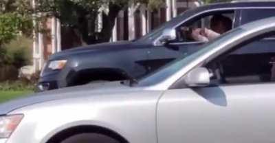 Democrat yells at Trump supporters then proceeds to rear end a car right in front of cops