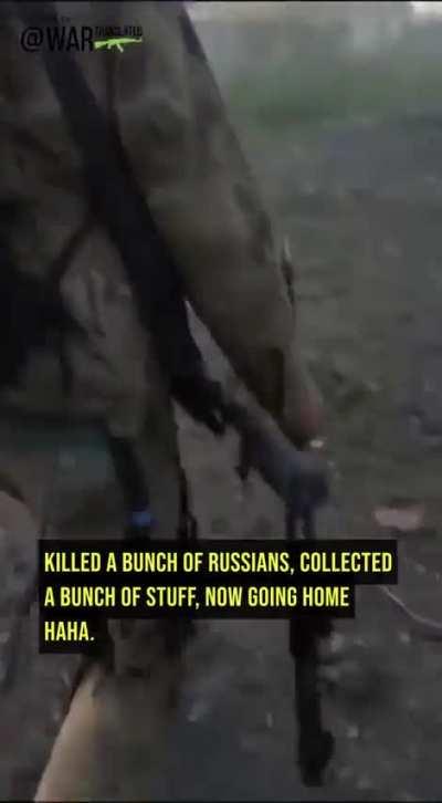 UA POV: Ukrainian soldiers from 7th Battalion inspecting destroyed Russian equipment and collecting weapons from deceased Russian soldiers, Staromaiorske area.