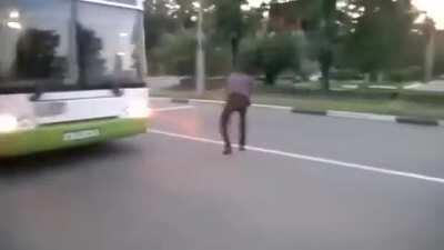 Tries to stop a bus, gets pepper sprayed