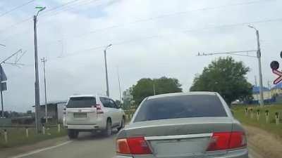 WCGW speeding through a railway crossing