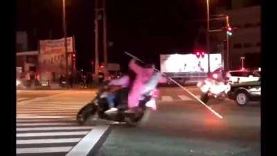 Japanese police dealing with bikers.
