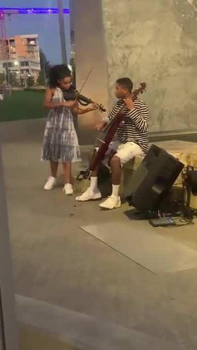 Brother and sister at Vancouver Wa. Waterfront last night killin some cello and violin.